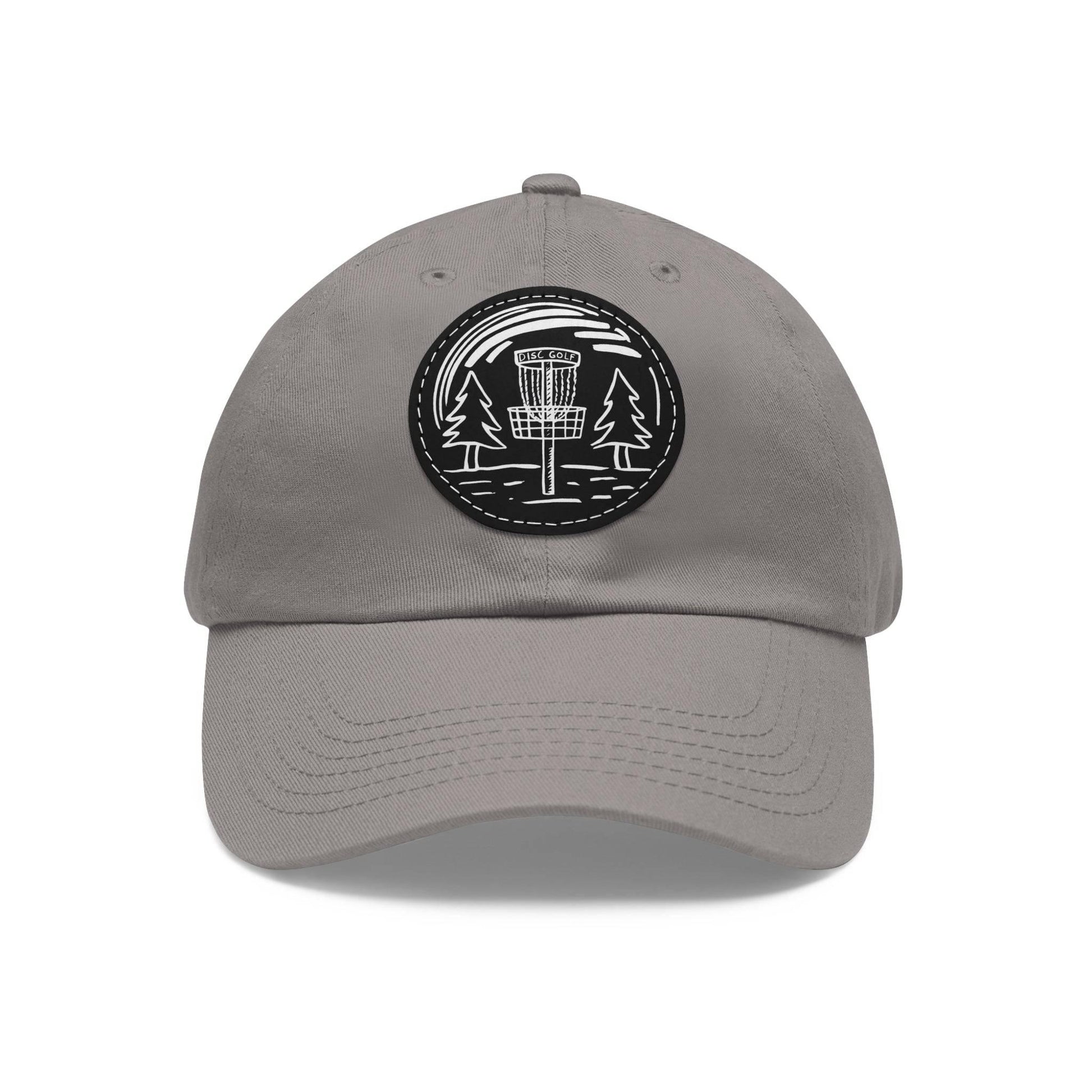 Fun Disc Golf Hat - Line Drawing of Trees and Disc Golf Basket - Dad Hat with Leather Patch (Round) - Quirky Goodies