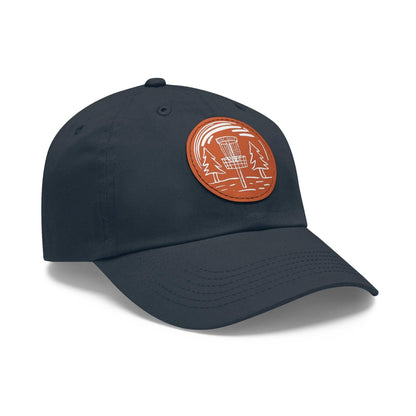 Fun Disc Golf Hat - Line Drawing of Trees and Disc Golf Basket - Dad Hat with Leather Patch (Round) - Quirky Goodies