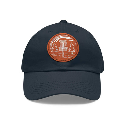 Fun Disc Golf Hat - Line Drawing of Trees and Disc Golf Basket - Dad Hat with Leather Patch (Round) - Quirky Goodies